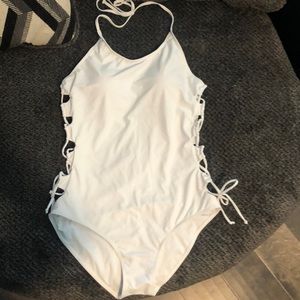 Woman’s one piece white bathing suit. Sexy Large